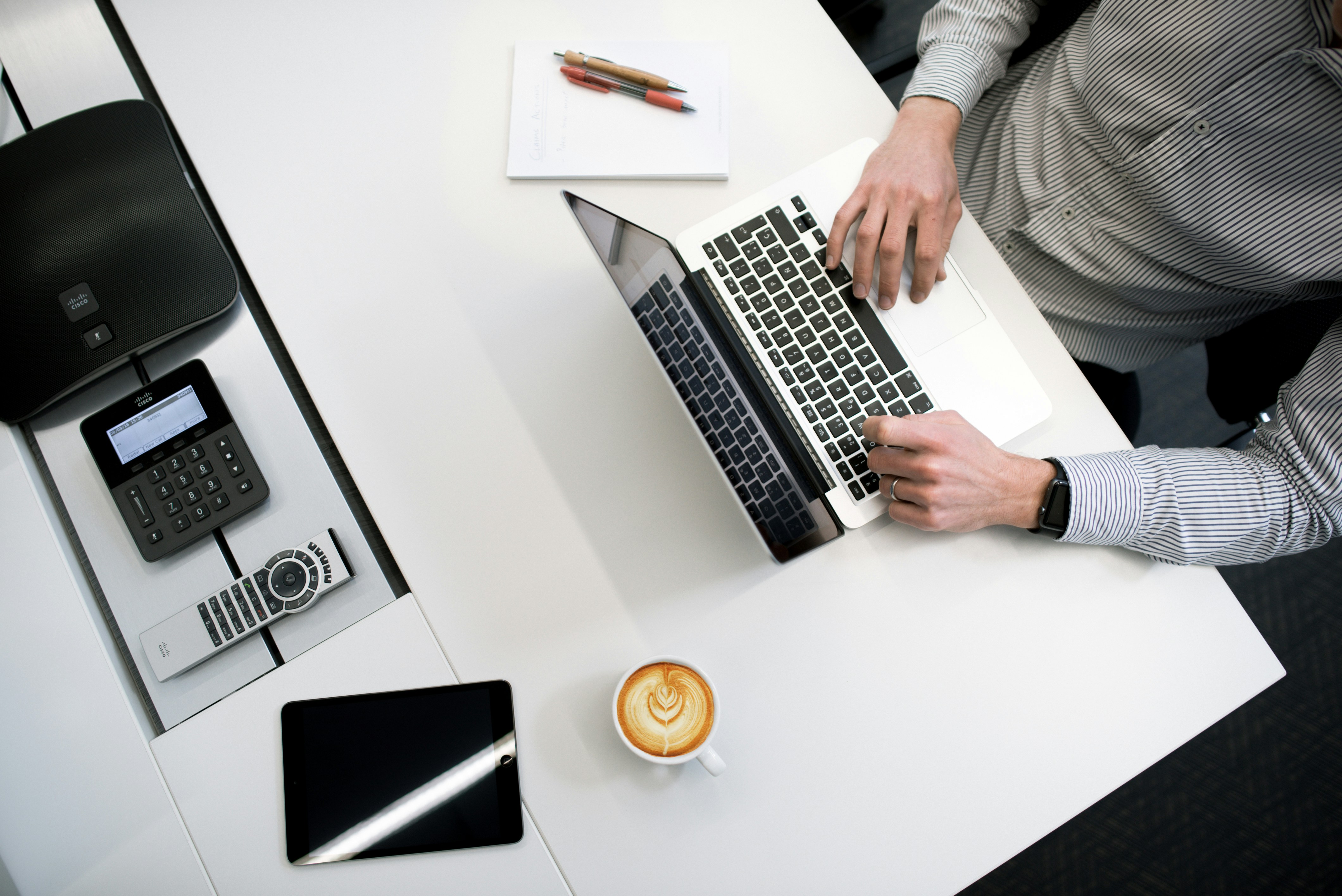 Attorney working on laptop with modern time tracking dashboard